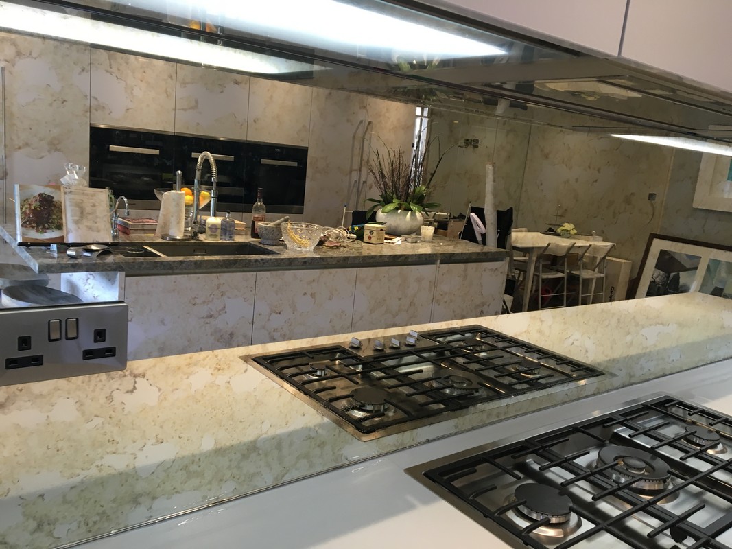 Mirror glass splashback in Penge luxury kitchen